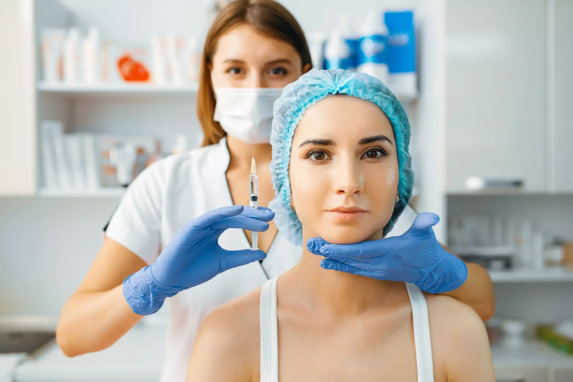 cosmetician-holds-syringe-with-injection-of-botox.jpg